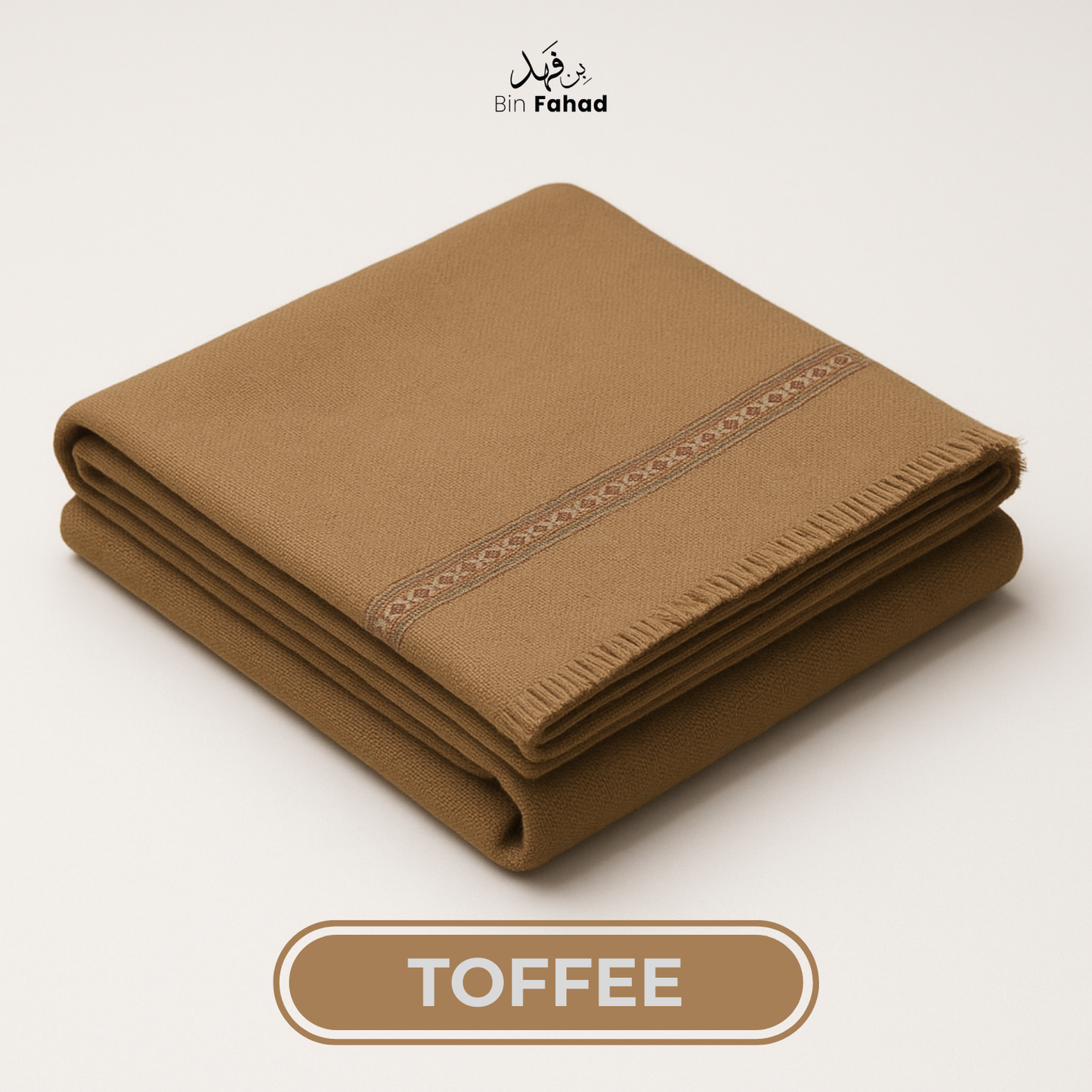 Folded brown fabric with embroidered edge on a light beige background, featuring the brand 'Bin Fahad'.