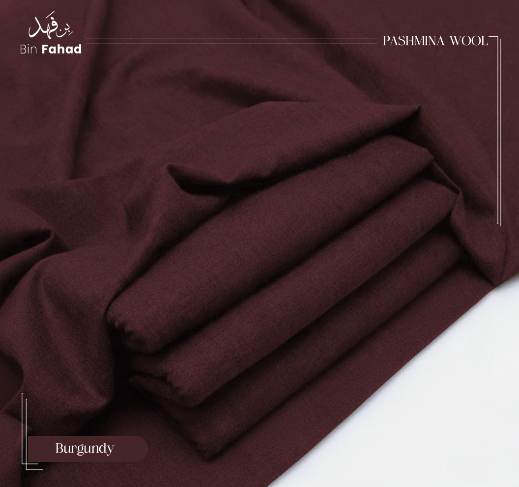 Burgundy pashmina wool fabric on a white background