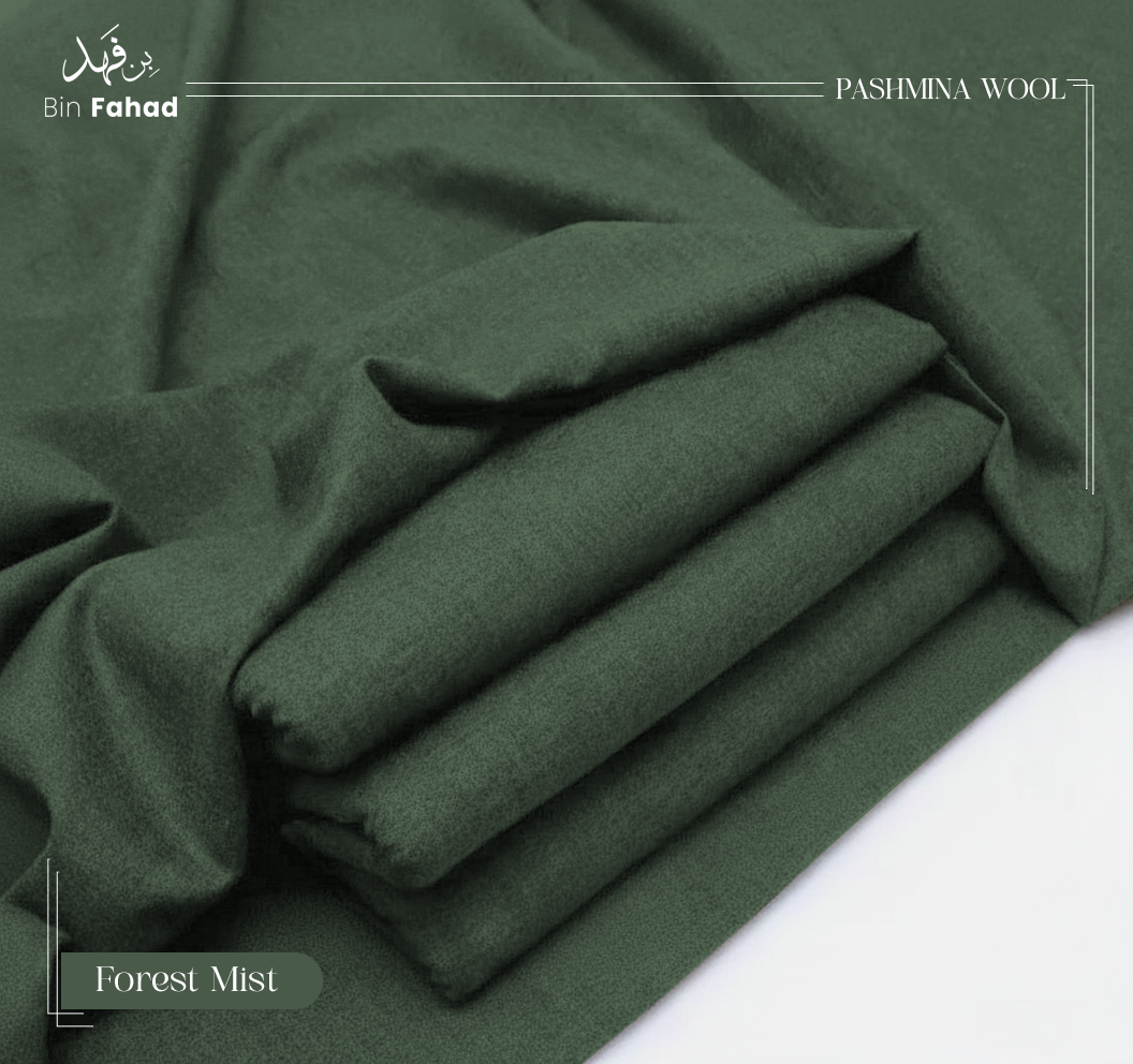 Folded green pashmina wool fabric with 'Bin Fahad' branding on a white background