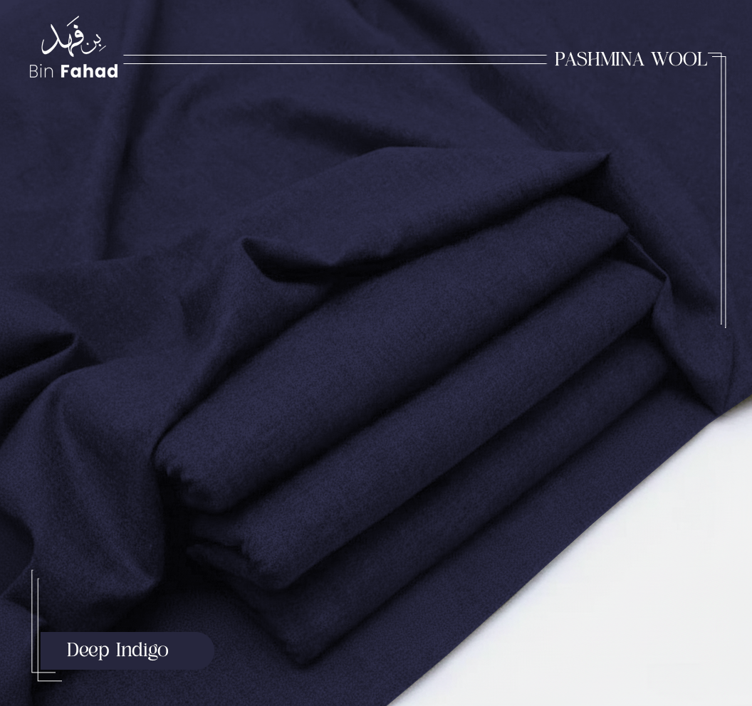 Folded navy blue pashmina wool with 'Bin Fahad' branding on a white background